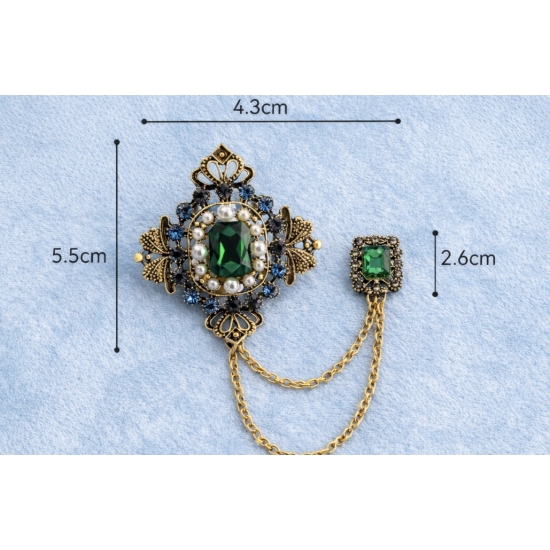 Podwójna broszka vintage – kolor, symetria i styl z charakterem.